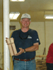 JPEG 77KB - Jim Hanson with his plaque which is similar to pieces installed on each bed unit.