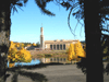 JPEG 102KB - Autumn view of Holcomb Bell Tower from across the lake.