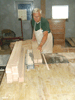 JPEG 129KB - Jack Tennison cutting one of many bed posts.