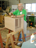 JPEG 148KB - Bob Steele assembling a cabinet.