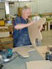 JPEG 138KB - Forrest Dickerson cleaning up a rocking chair piece.