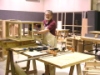 Gayle Berry assembling one of the desk consoles.