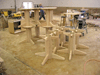 A bunch of table pedestals.