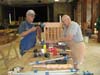 Bill Bauerle and Loyd Ervin assemble a night stand for a new motel room.