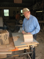 Stan Foskett stays very busy; in this case, he's routing safety rail pieces.