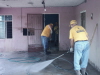 Squeegeeing and high pressure spraying was required in all the flooded houses.