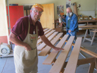 Buddy Nafe, our Furniture Building Ministry leader, stays busy in the paint shop.