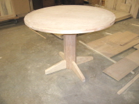 A small round table for the pastor's study.