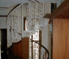JPEG 36KB - This is the wrought-iron staircase to the upper floor.  It is beautiful but impossible to clean, very hard to go up and down, and rough on the bare feet.