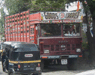 JPEG 61KB - Typical cross country truck.  The driver sits on a welded frame with minimal padding.  The passenger seat is even less comfortable if it has one.