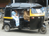 JPEG 48KB - This is the most common and most reliable form of local transportation.  It's an "auto ricksha".